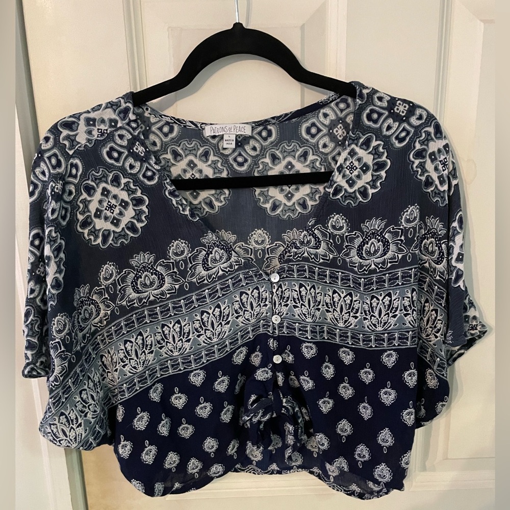 Cropped blue and white knot tie shirt